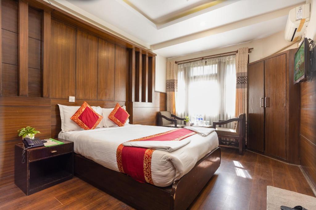 Postel nebo postele na pokoji v ubytování Hotel Buddha