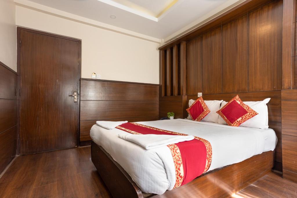 Postel nebo postele na pokoji v ubytování Hotel Buddha