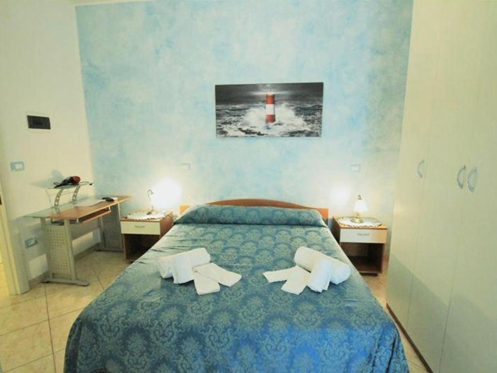 Postel nebo postele na pokoji v ubytování B&B Arcobaleno - Costa