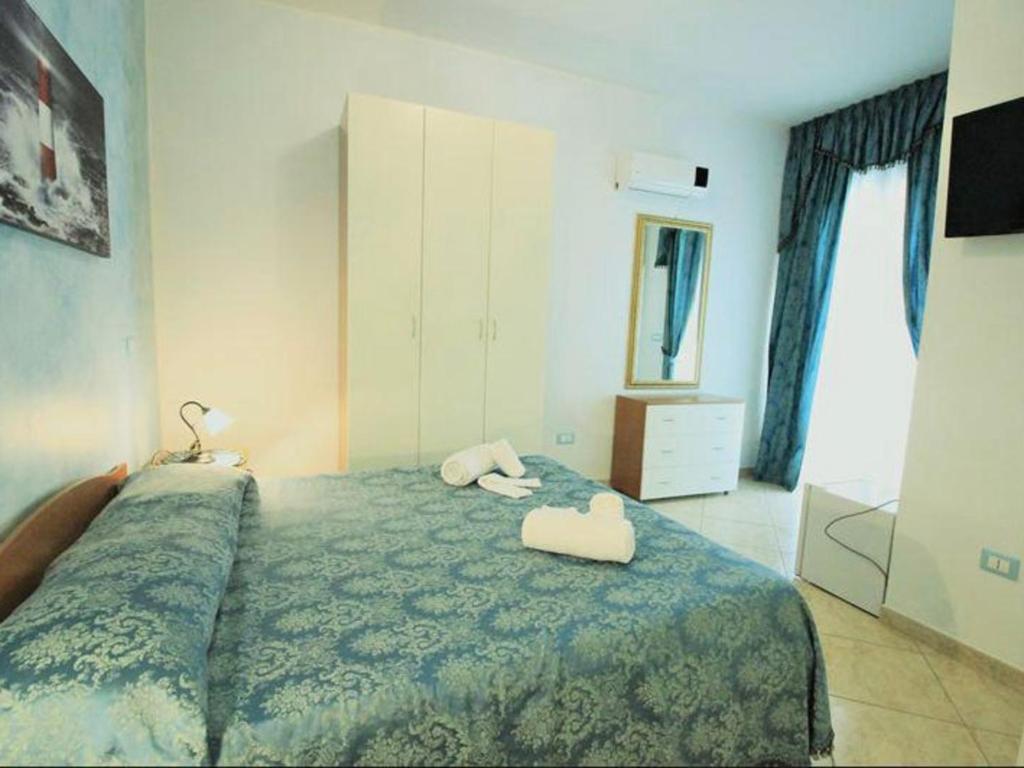 Postel nebo postele na pokoji v ubytování B&B Arcobaleno - Costa