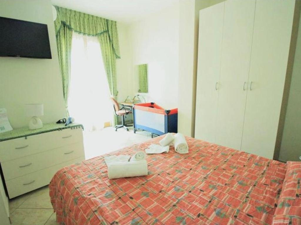 Postel nebo postele na pokoji v ubytování B&B Arcobaleno - Costa