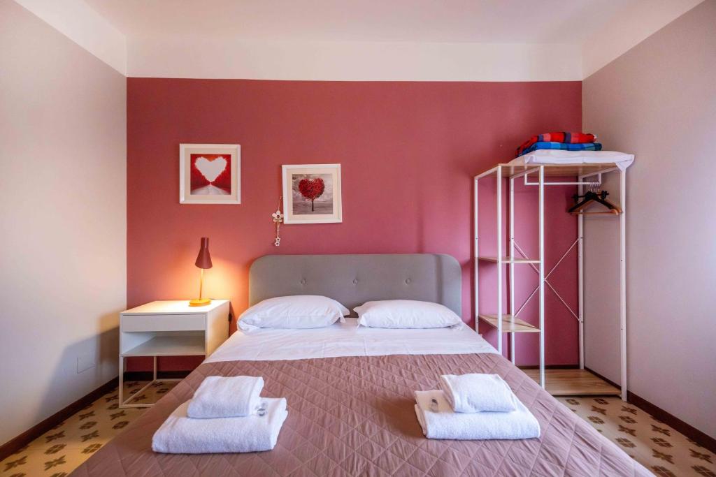 Postel nebo postele na pokoji v ubytování Casapiu Rooms