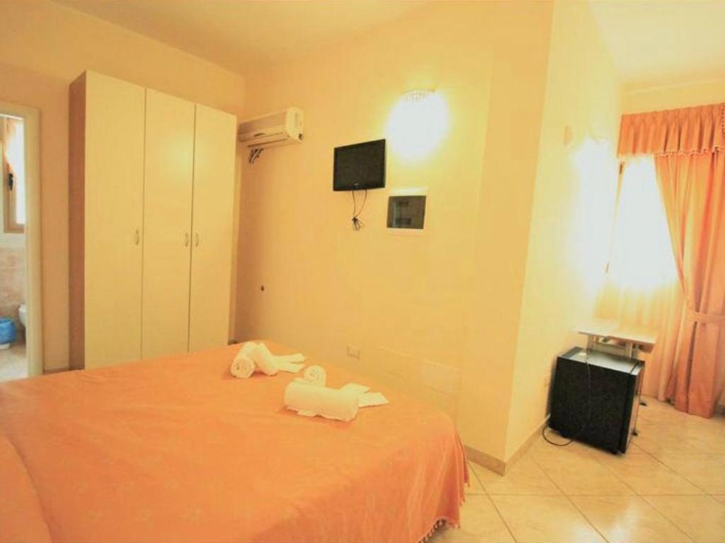 TV a/nebo společenská místnost v ubytování B&B Arcobaleno - Costa