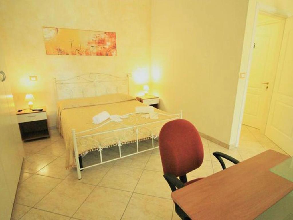 Postel nebo postele na pokoji v ubytování B&B Arcobaleno - Costa