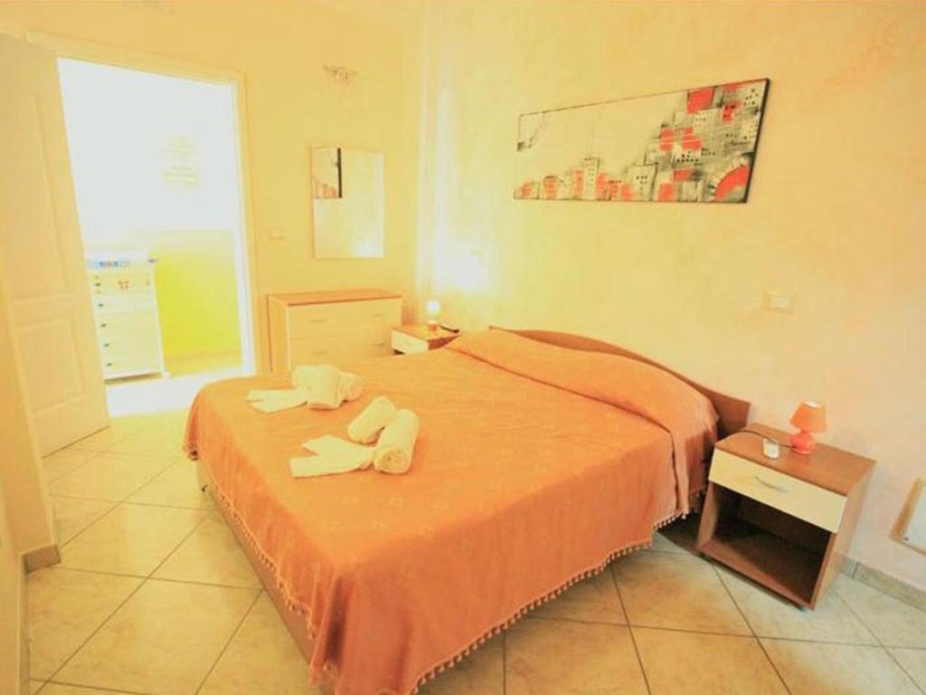 Postel nebo postele na pokoji v ubytování B&B Arcobaleno - Costa