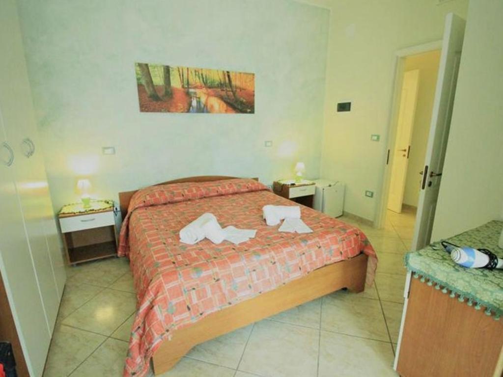 Postel nebo postele na pokoji v ubytování B&B Arcobaleno - Costa