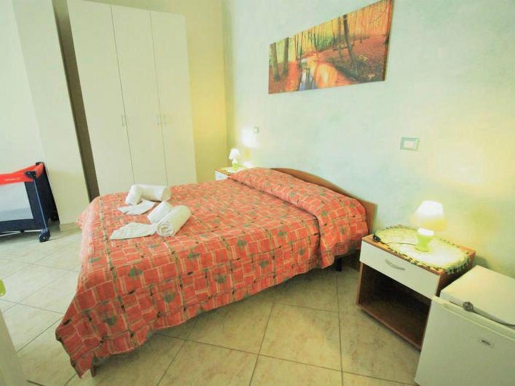 Postel nebo postele na pokoji v ubytování B&B Arcobaleno - Costa
