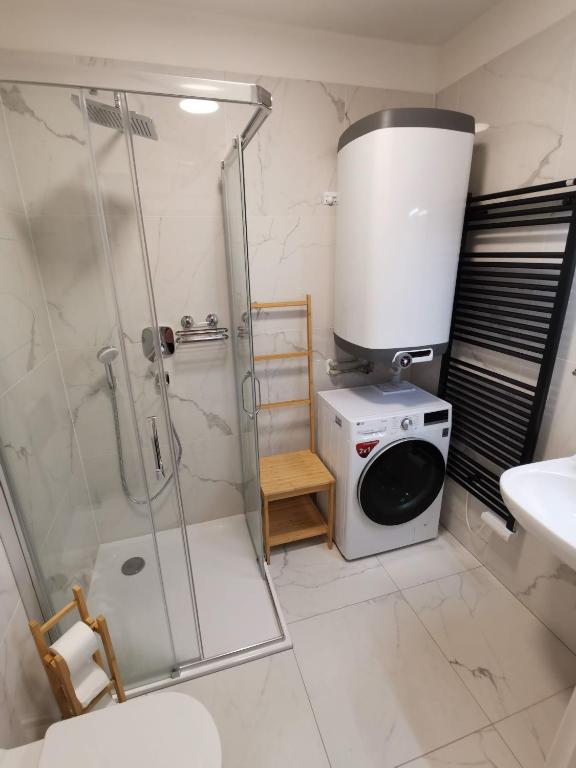 Koupelna v ubytování Horský apartmán v resortu se službami a wellness