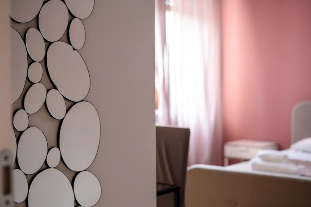 Postel nebo postele na pokoji v ubytování Casapiu Rooms