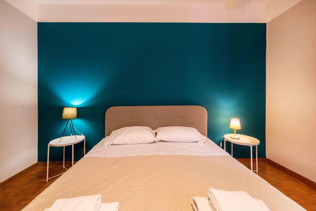 Postel nebo postele na pokoji v ubytování Casapiu Rooms