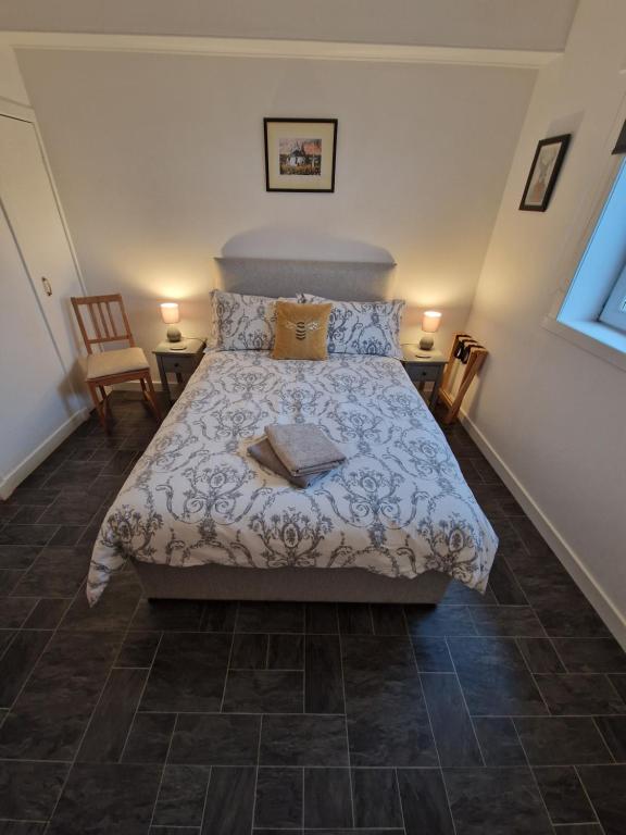 Postel nebo postele na pokoji v ubytování Cala Sith Guesthouse