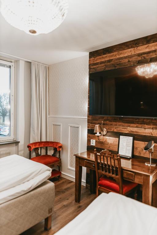 Postel nebo postele na pokoji v ubytování Havshotellet