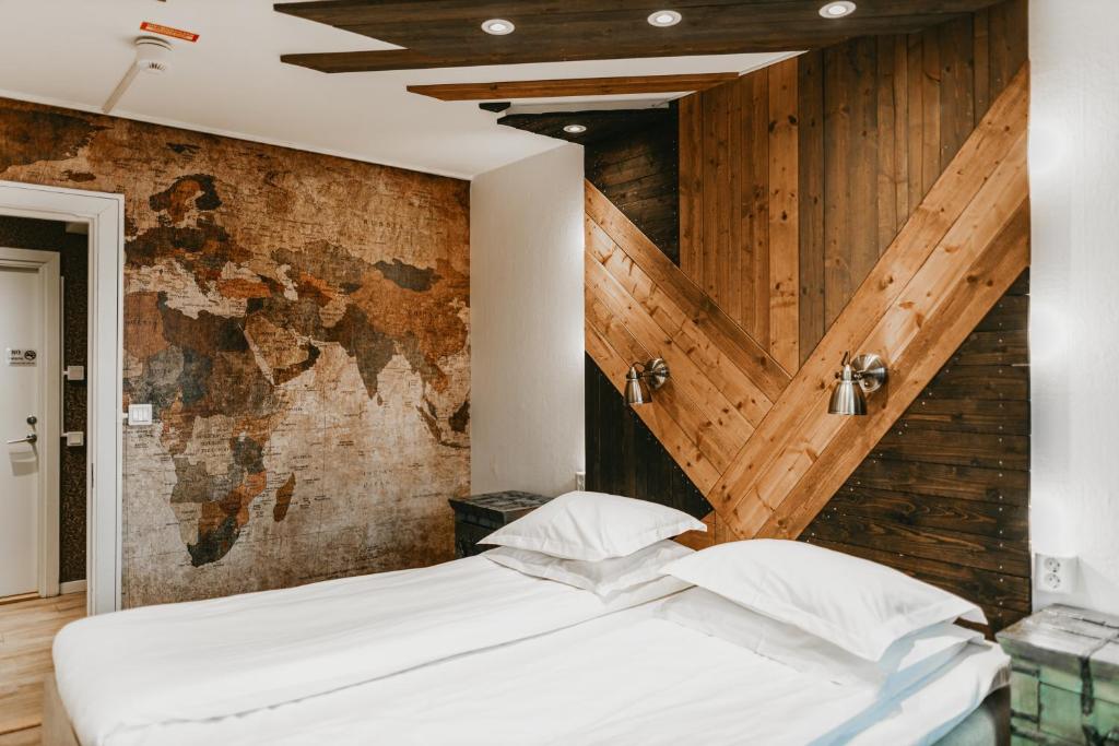Postel nebo postele na pokoji v ubytování Havshotellet