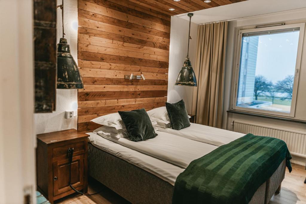 Postel nebo postele na pokoji v ubytování Havshotellet