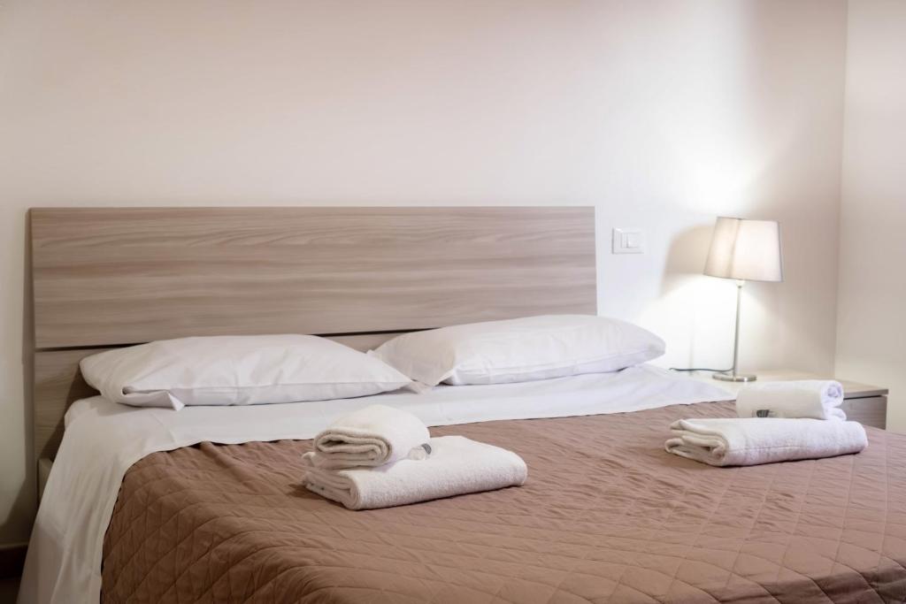 Postel nebo postele na pokoji v ubytování GuestHouse127