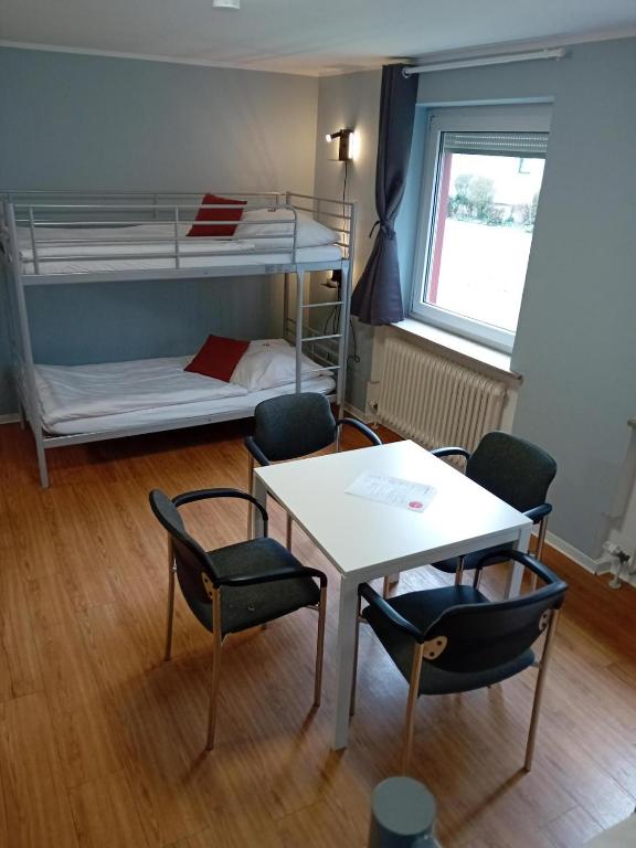 Postel nebo postele na pokoji v ubytování 1, 2, sleep Hostel Nürnberg Messe