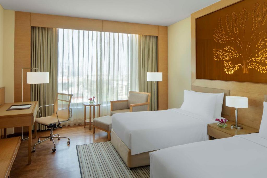 Postel nebo postele na pokoji v ubytování Radisson Blu Hotel New Delhi Dwarka
