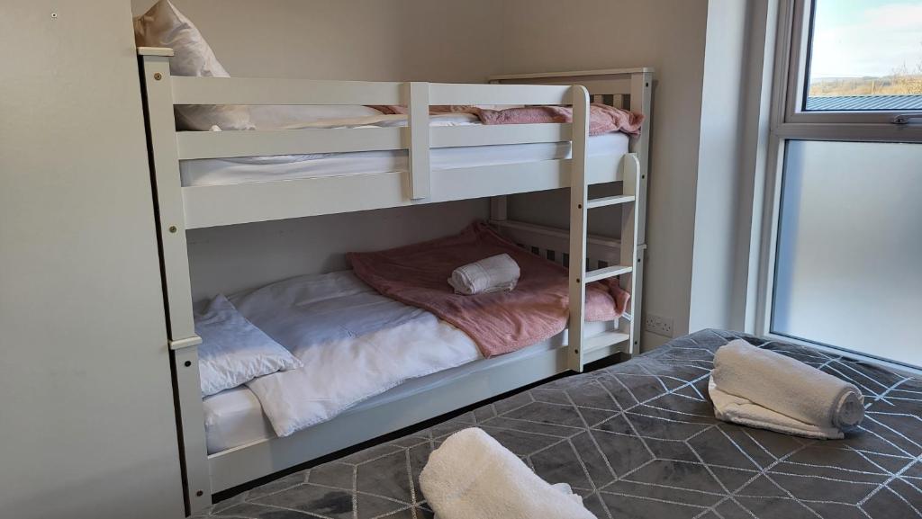 Letto o letti in una camera di Trivia House