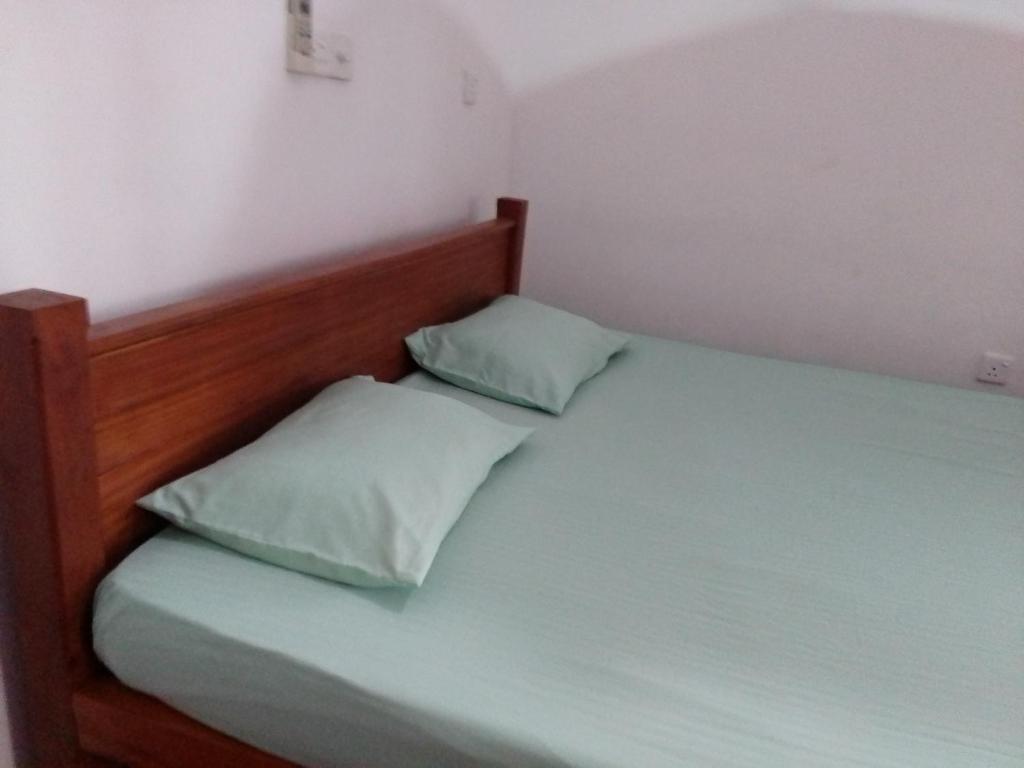 Postel nebo postele na pokoji v ubytování Pravindi Guest Home