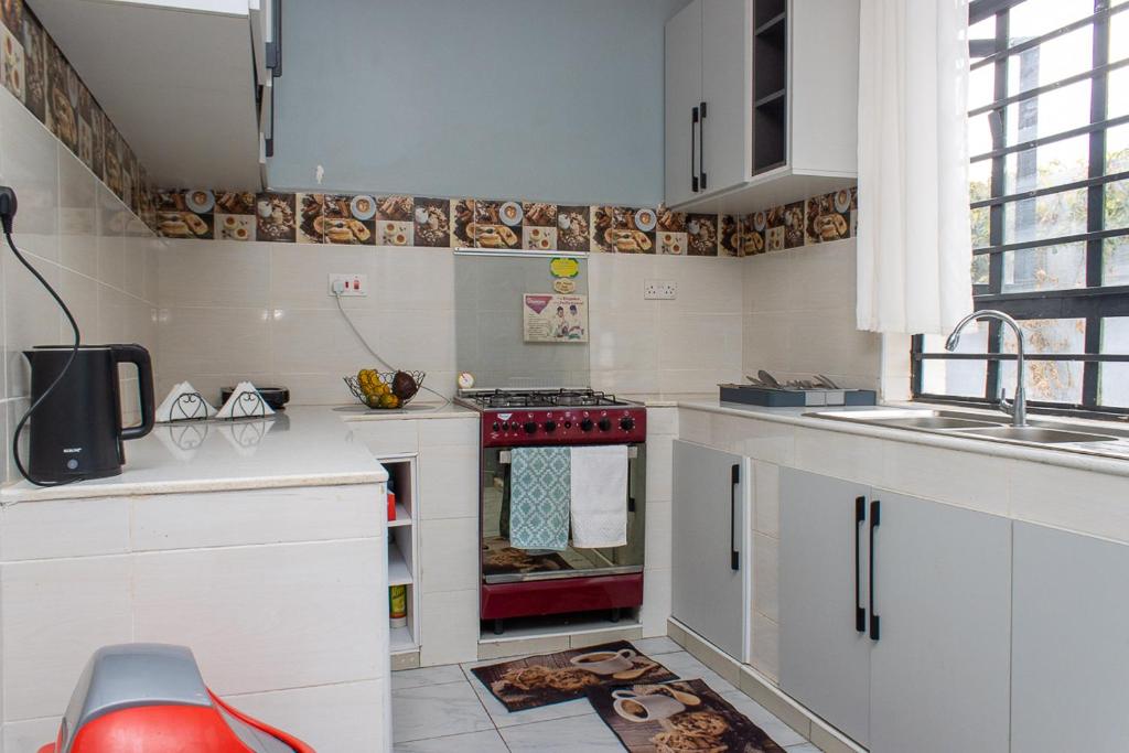 Kuchyň nebo kuchyňský kout v ubytování Crystal homes by chema