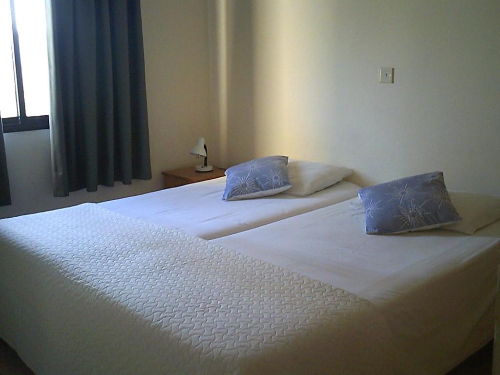 Postel nebo postele na pokoji v ubytování Panklitos Tourist Apartments