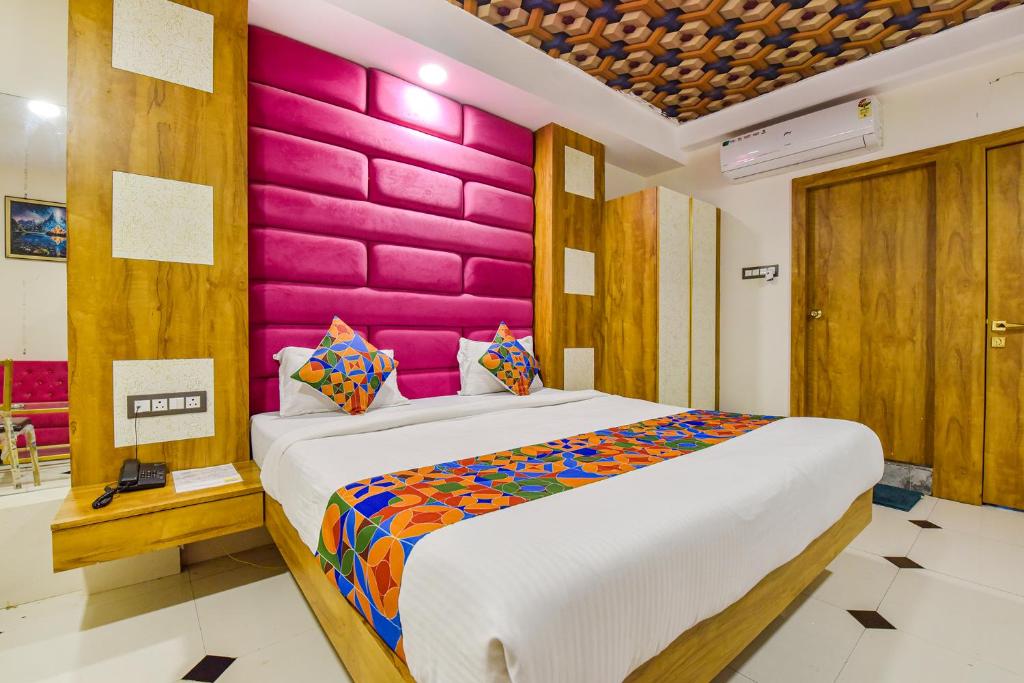 Postel nebo postele na pokoji v ubytování FabHotel Signor