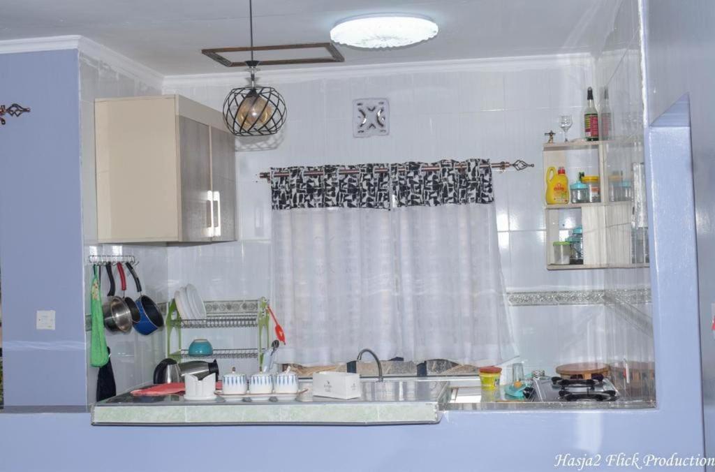 Kuchyň nebo kuchyňský kout v ubytování Crystal Homes