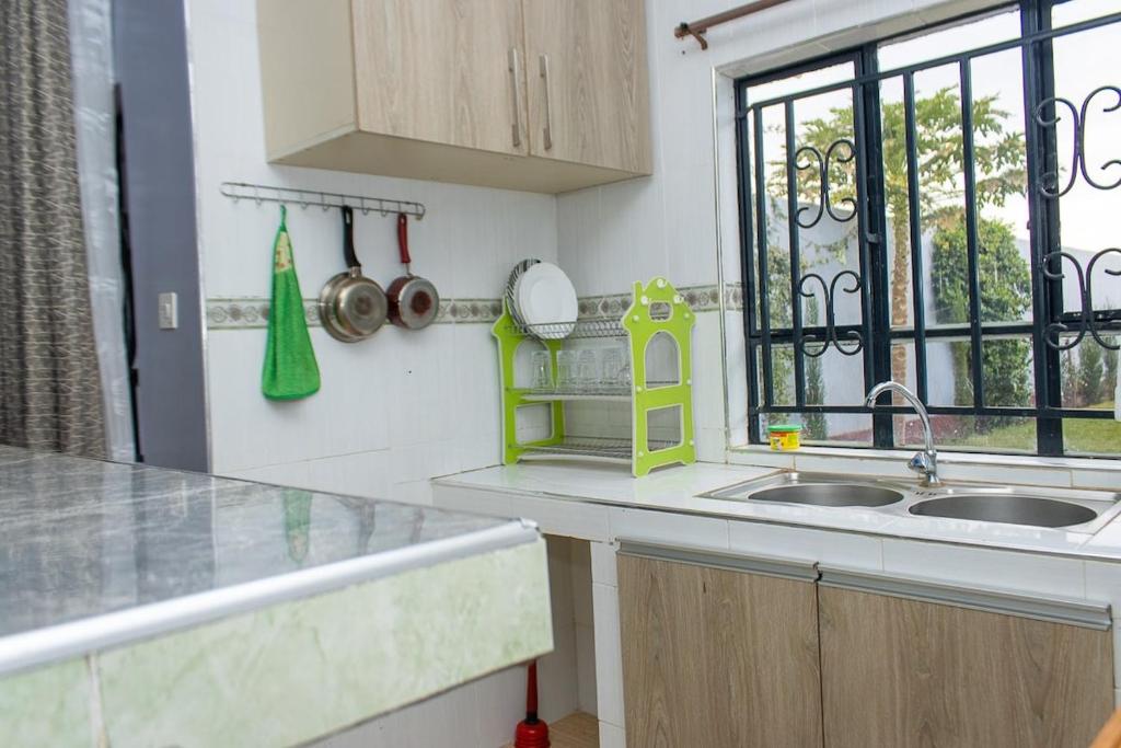 Kuchyň nebo kuchyňský kout v ubytování Crystal Homes