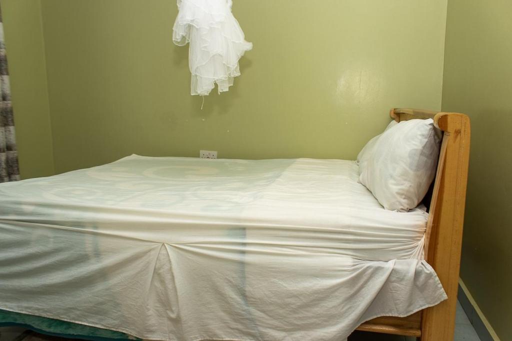 Postel nebo postele na pokoji v ubytování Crystal Homes