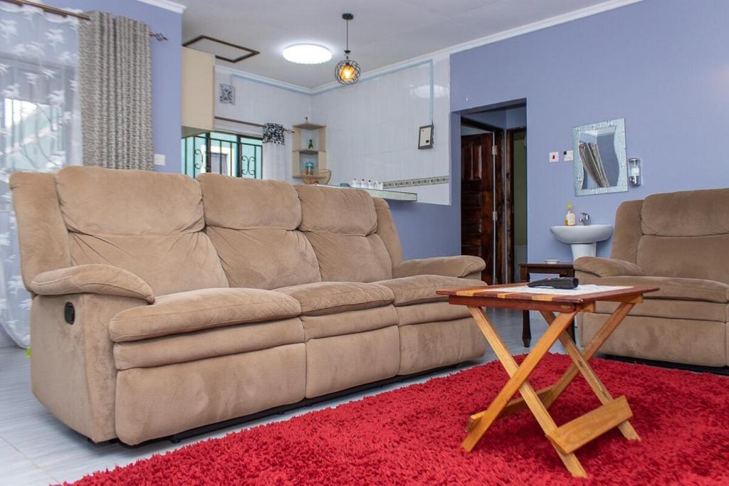 Posezení v ubytování Crystal Homes