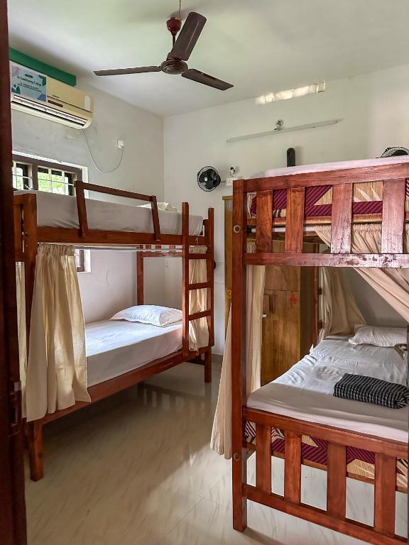 Postel nebo postele na pokoji v ubytování Molly's Hostel