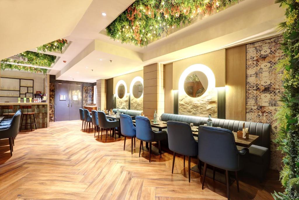 Posezení v ubytování Hotel Uptown 1Km Connaught Place