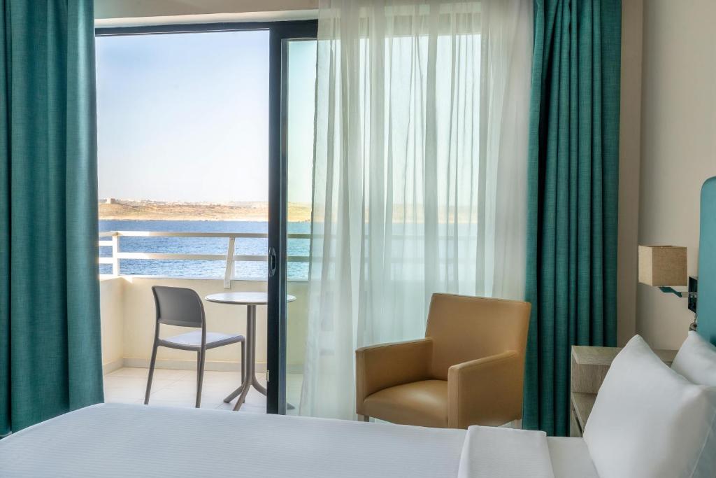 Postel nebo postele na pokoji v ubytování Riviera Spa Resort - Adults Only