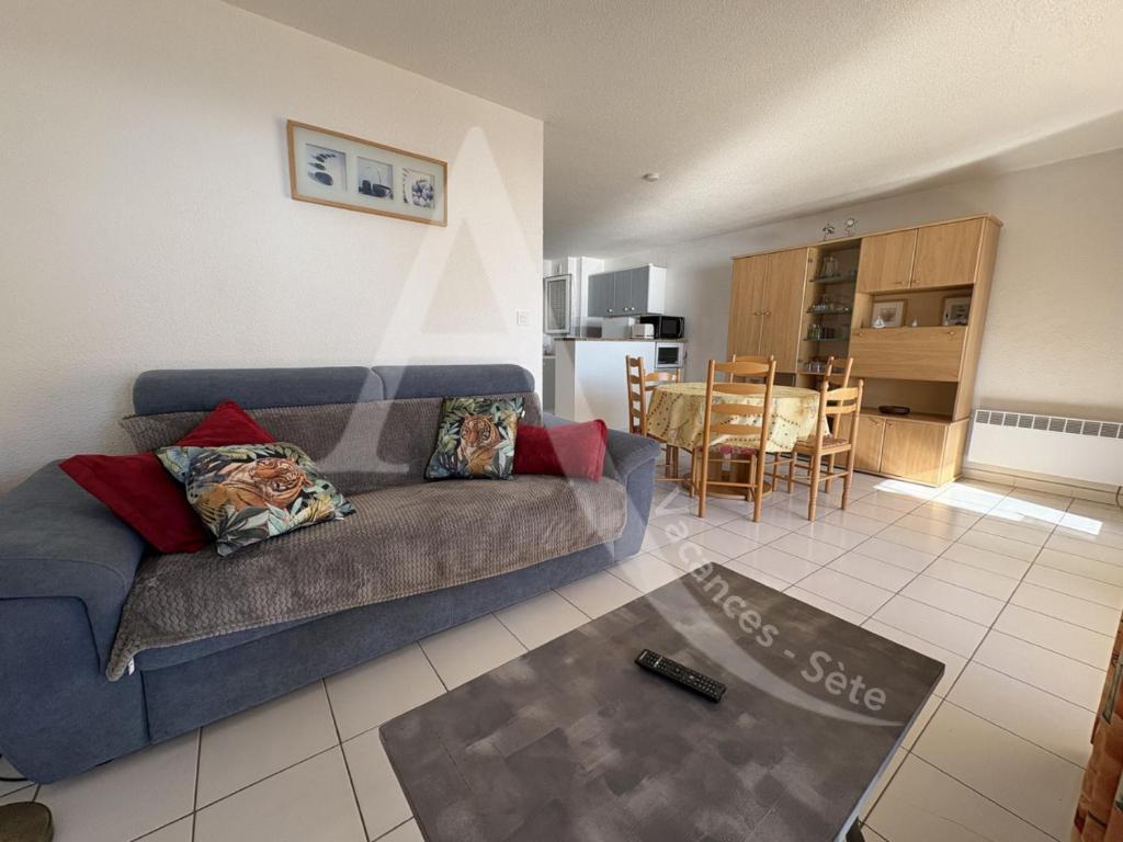 Posedenie v ubytovaní appartement 1 chambre avec terrasse vue mer dans residence avec piscine