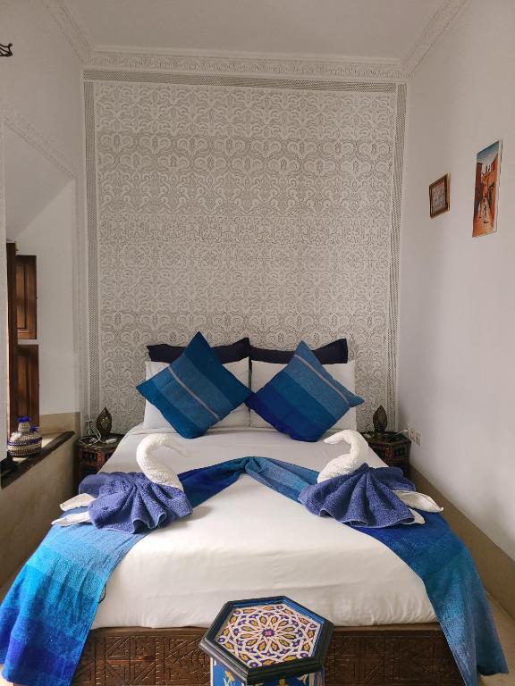 Postel nebo postele na pokoji v ubytování Riad Parfum d'Orient