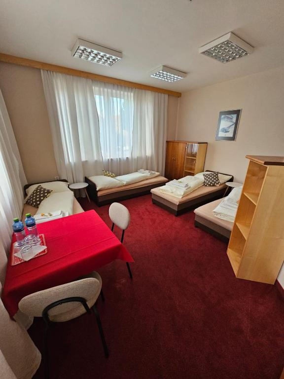 Postel nebo postele na pokoji v ubytování Penzión KOVOX