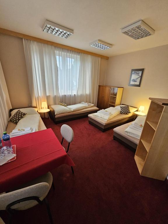 Postel nebo postele na pokoji v ubytování Penzión KOVOX