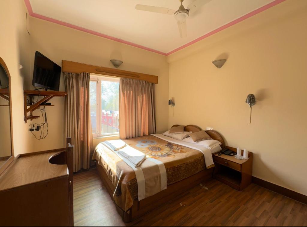 Postelja oz. postelje v sobi nastanitve Green Tara Hotel