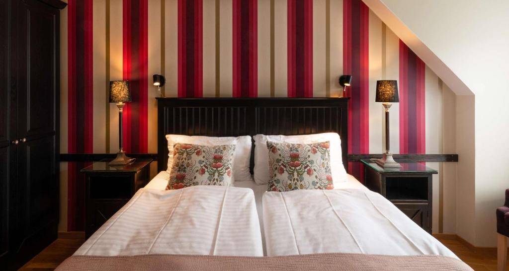 Postel nebo postele na pokoji v ubytování Best Western Plus Hotel Noble House