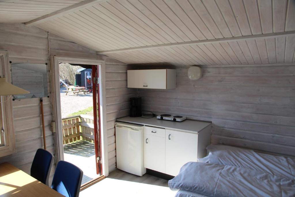 Kuchyň nebo kuchyňský kout v ubytování Fjordlyst Camping & Cottages
