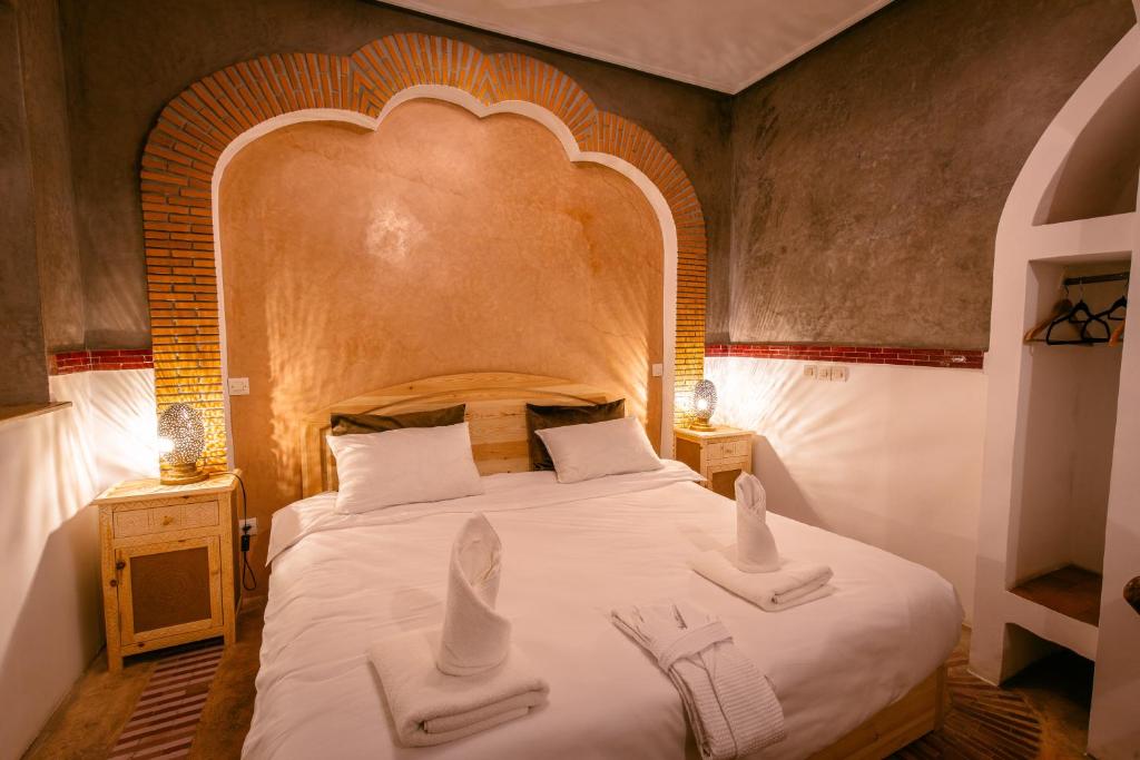 Postel nebo postele na pokoji v ubytování Riad Aicha Marrakech