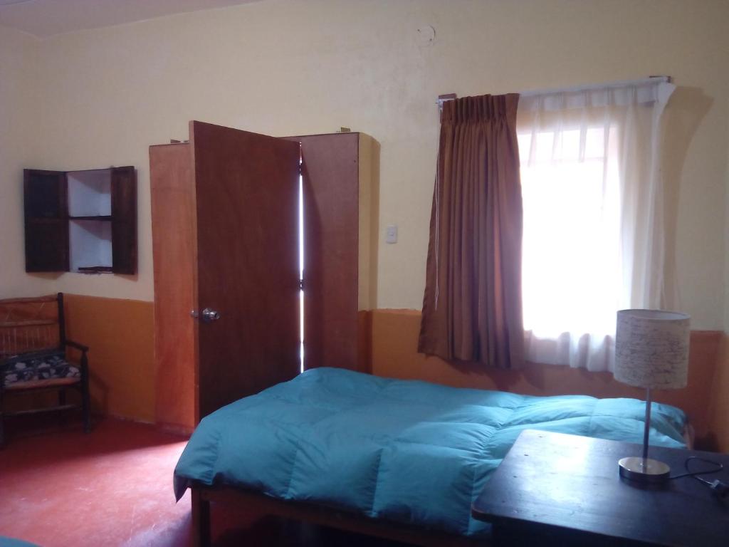 Postel nebo postele na pokoji v ubytování Kurumi Hostel
