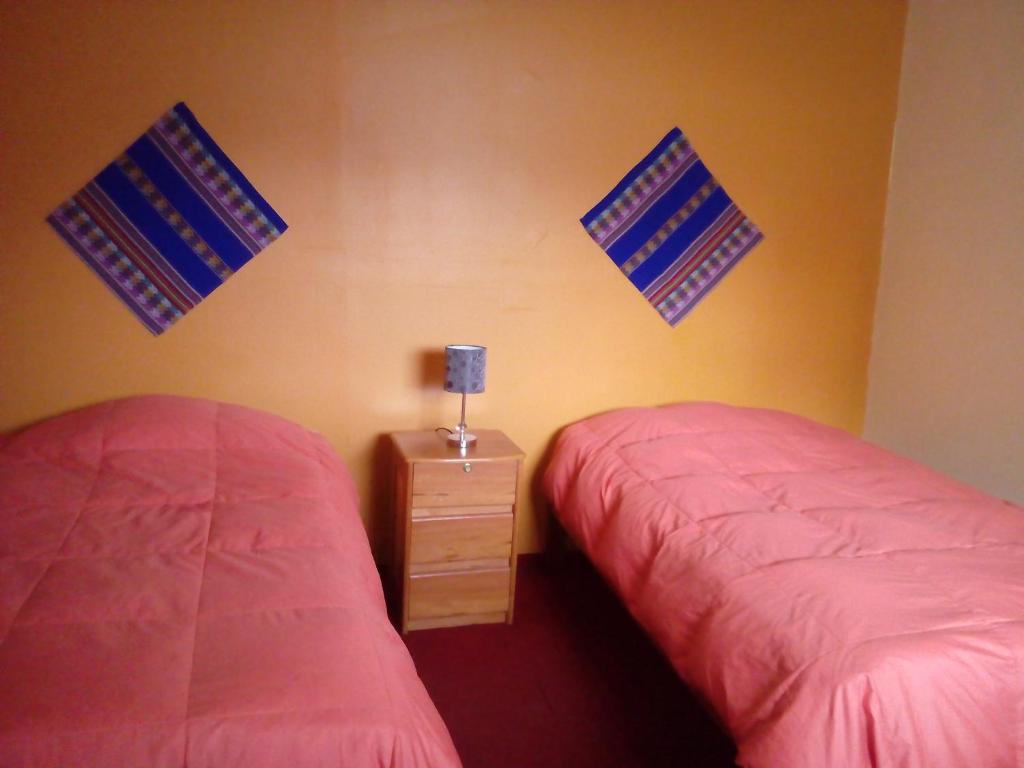 Postel nebo postele na pokoji v ubytování Kurumi Hostel