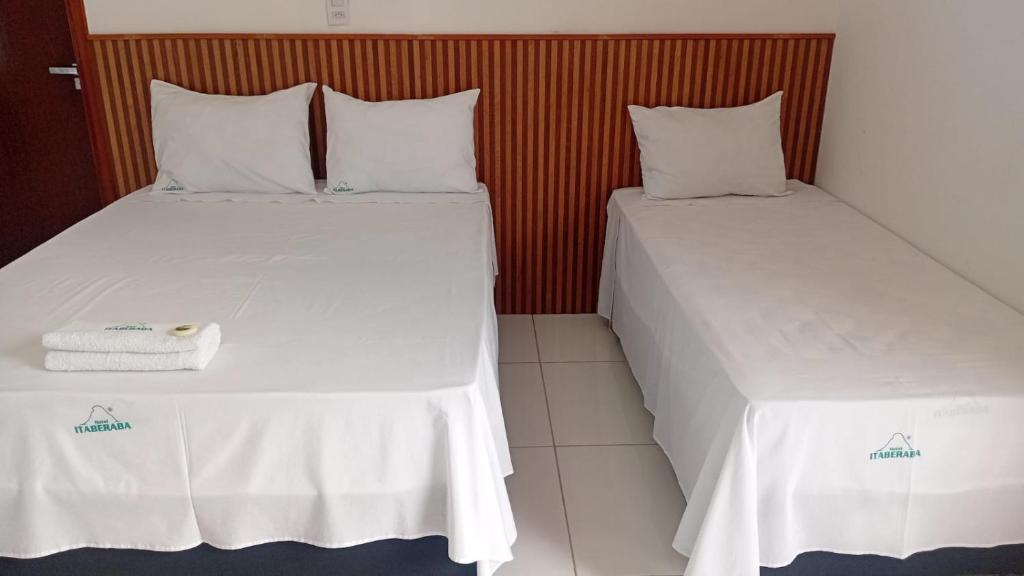 Postel nebo postele na pokoji v ubytování Hotel Itaberaba