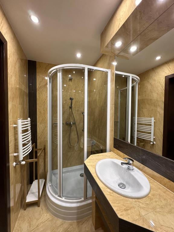Kúpeľňa v ubytovaní Apartamenty z widokiem na Tatry Cztery Pory Roku