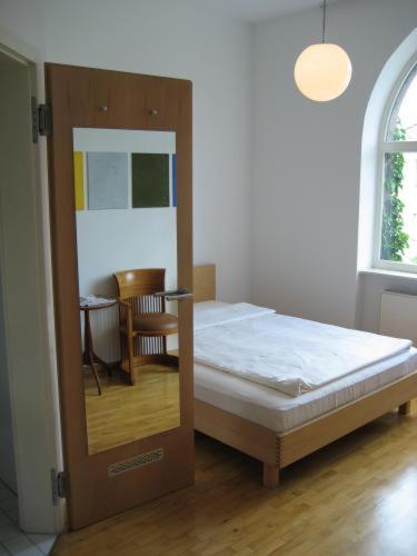 Postel nebo postele na pokoji v ubytování Art-Hotel Robert Mayer