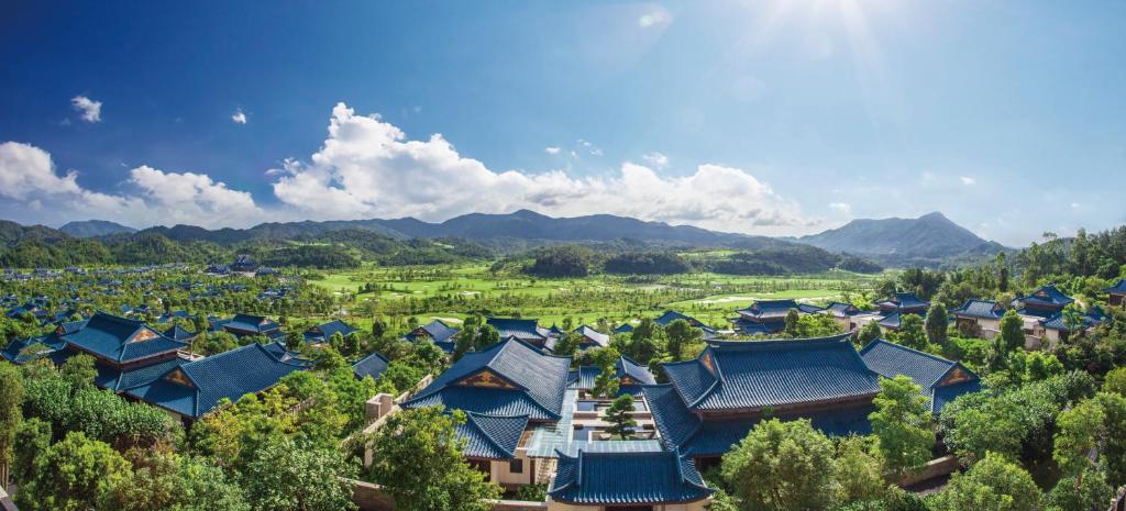 an overhead view of a village with blue roofs at Imperial Springs in Conghua
