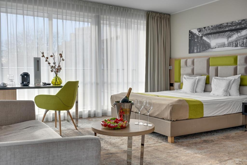 Posteľ alebo postele v izbe v ubytovaní HOTEL ALMOND BUSINESS & SPA BY GRANO - GRANO HOTEL Gdańsk Riverside