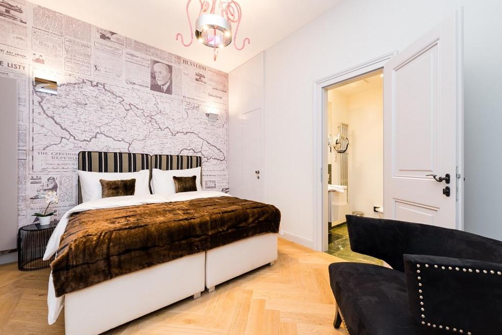 Postel nebo postele na pokoji v ubytování Old Royal Post Boutique Hotel & Premium Suites
