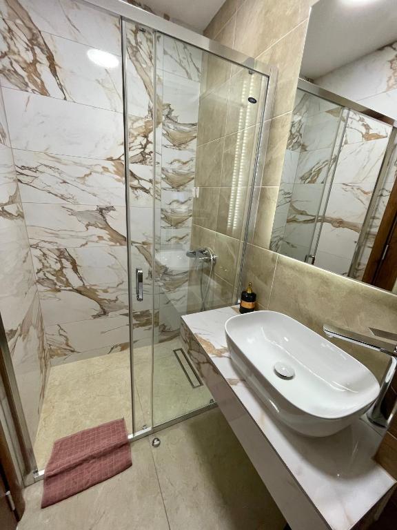 Koupelna v ubytování Pink Apartmani